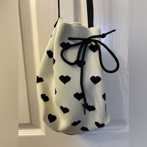 Cross body white with black hearts purse